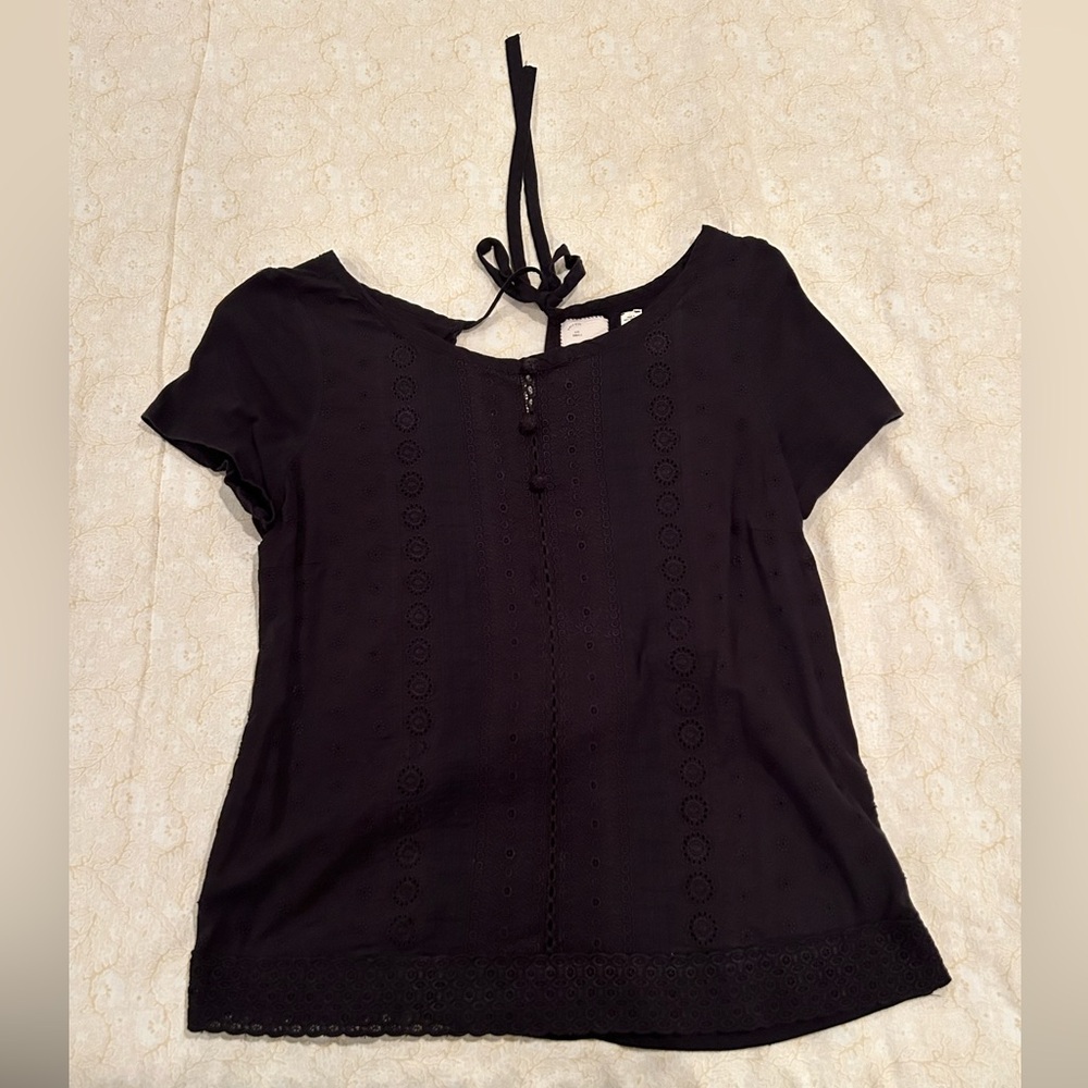 Anthropologie black eyelet blouse with back ribbon tie - size S